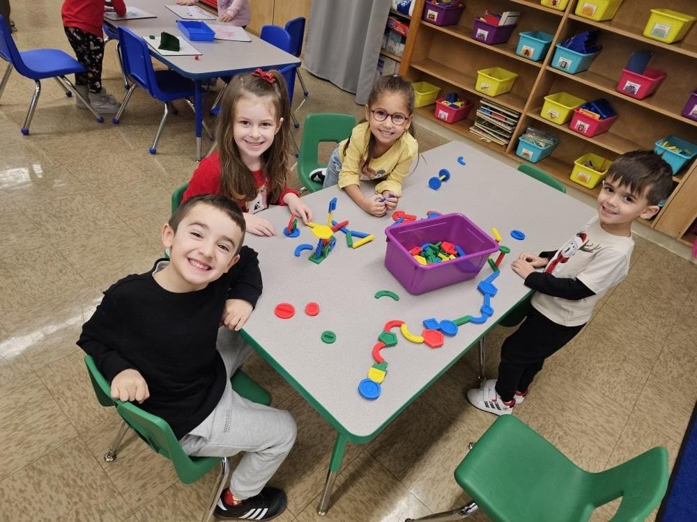 Children playing with colorful building blocks